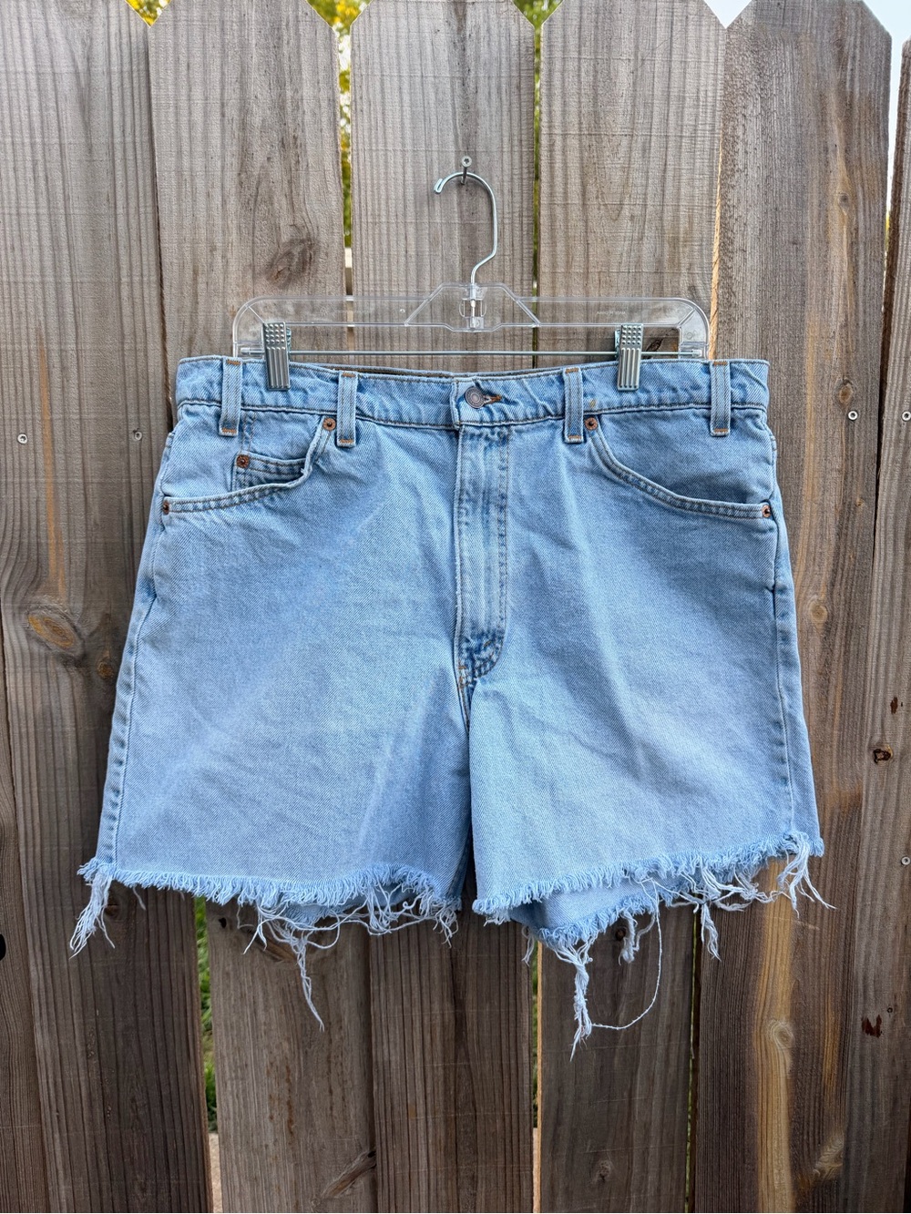 Vintage 97’ Levi's Light Blue Distressed Denim Cutoff Shorts Size 38